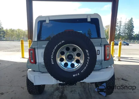 2023 Ford Bronco Wildtrak from USA, damaged, VIN 1FMEE5DP2PLC19008